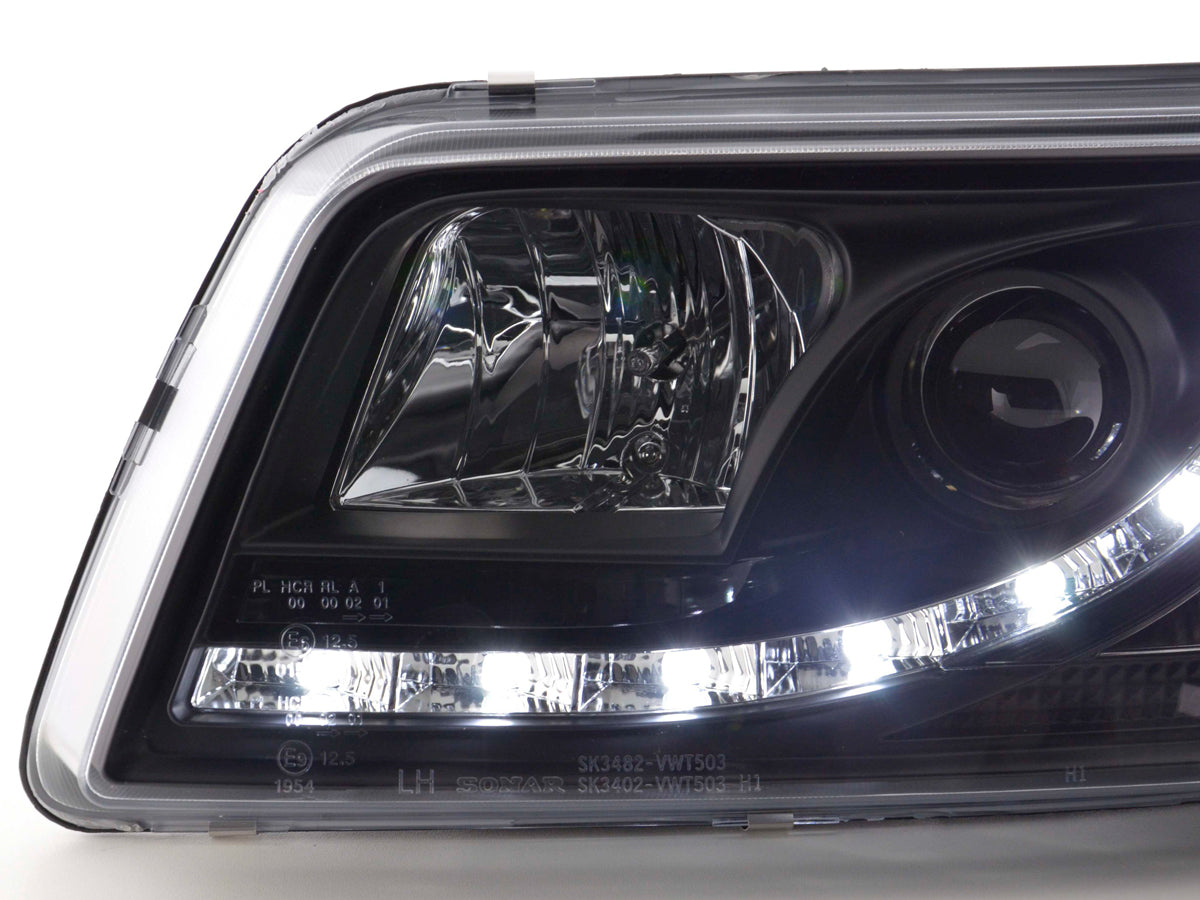Scheinwerfer Set Daylight LED Tagfahrlicht VW Bus T5 03-09 schwarz Scheinwerfer Set Daylight LED Tagfahrlicht VW Bus T5 03-09 schwarz